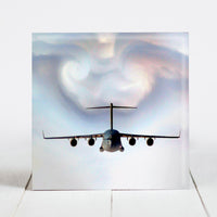 US Air Force C-17 Globemaster Parts the Clouds